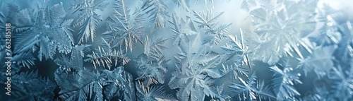 An intricate lattice of frost patterns on a glass surface  capturing the beauty of cold 