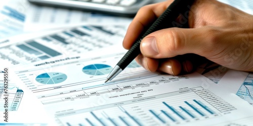 analyzing financial data sheets on the table
