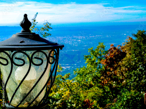 Lamp post with hills in the background