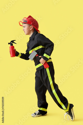 Cute little firefighter wit...