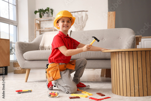 Cute little builder with to...