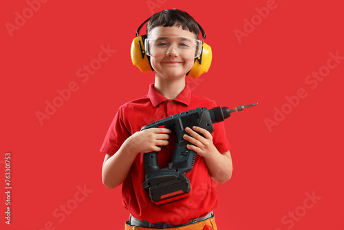 Cute little builder with dr...