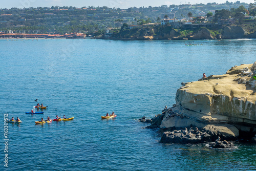 Kayakers observing sea lions in La Jolla cove, San Diego, California