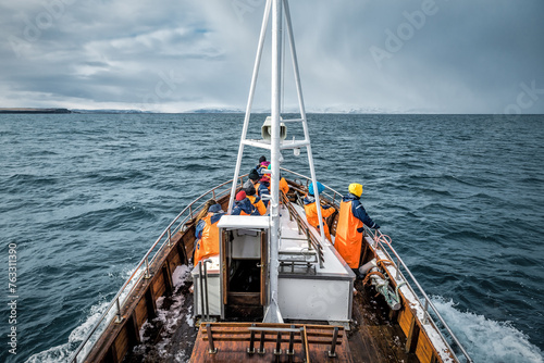 Fotografía Fishers on the fishing boat in the sea of nordic country