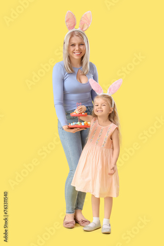 Happy mother and her little...