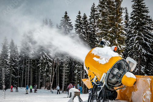 Working snow cannon maker on ski resort makes new snow