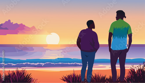 People walking on the beach at sunset