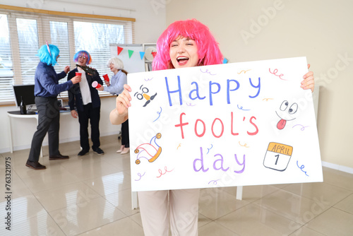 Business woman with poster ...