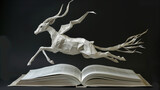 a book page sculpture of a leaping gazelle, meticulously crafted to capture motion, set against a dark background.