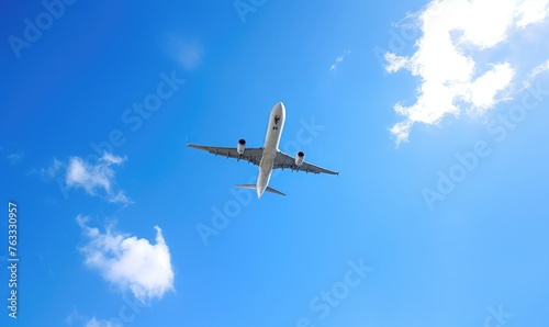 airplane flying in the blue sky