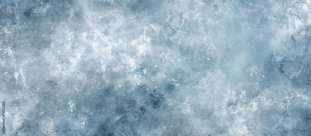 A closeup of a cloudy sky with cumulus clouds in a freezing winter pattern. The electric blue hues create a mesmerizing meteorological phenomenon, with wind waves visible within the clouds