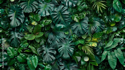 Dense greenery with varied tropical leaves  presenting shades of green and intricate patterns  perfect for nature and environment designs. Seamless pattern