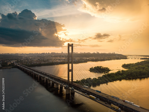 Aerial view of sunset, bridge over the river, Kyiv, Ukraine © gannusya