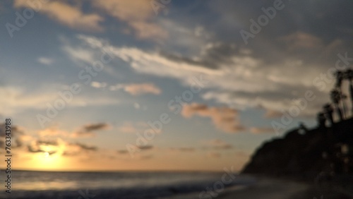 Southern California beach scenes with sunsets  surfers  tide pools and palms trees at Swamis Reef Surf Park and Moonlight Beach in Encinitas California.