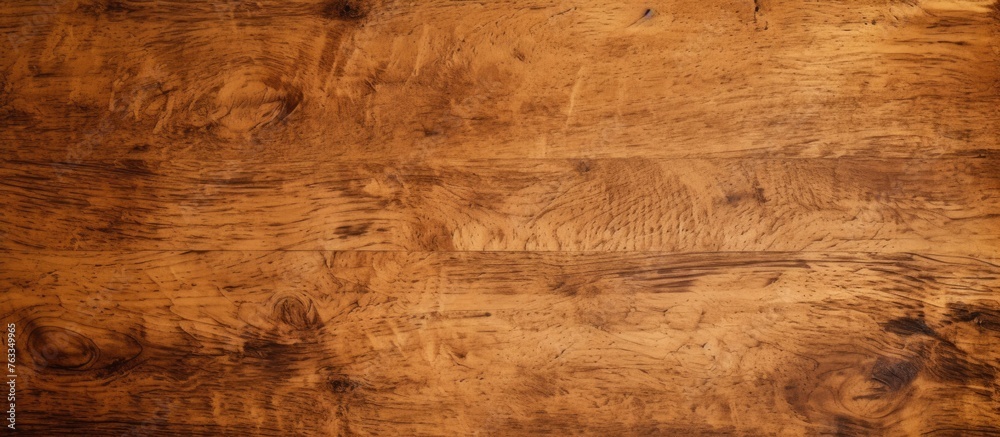 A close up of a wooden table with a brown surface