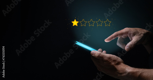 Person Giving a Bad Customer Review on a Smartphone photo