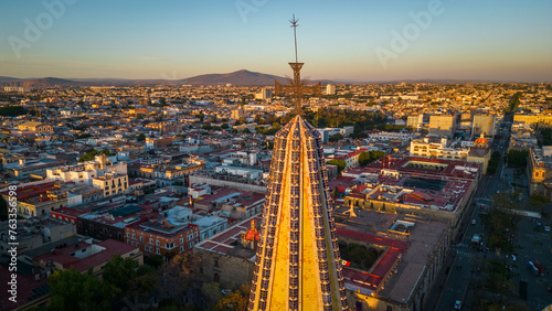 aerial Guadalajara Mexico jalisco capital cityscape with cross from main cathedral downtown historical at sunset 