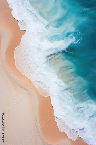 Water waves crashing on sandy shore, azure blue white and yellow hues