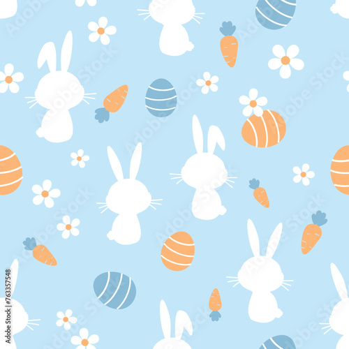 Seamless pattern with bunny rabbit cartoons, Easter eggs, carrot and daisy flower on blue background vector.