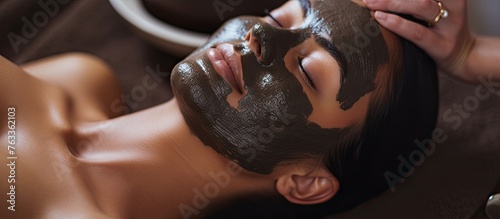 Woman receiving facial trea...