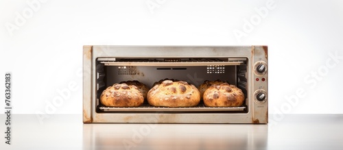 Four breads baking in oven ...