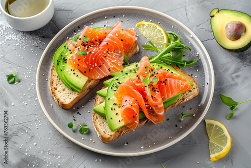 Top view of salmon avocado toasts on a plate, ideal for healthy eating themes.