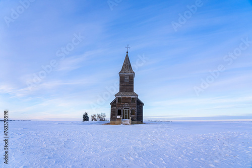 Abandoned Christ Lutheran Church in winter in rural Saskatchewan; Francis, Saskatchewan, Canada photo