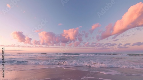 Serene Pink Sunset over the Atlantic Ocean in California with Dreamy Clouds photo