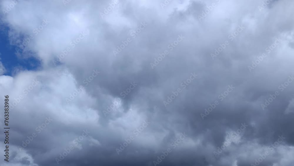 Impressive gray cumulus clouds move across the sky Impressive gray cumulus clouds move across the sky