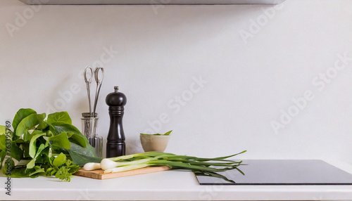 Kitchen background with kitchen utensils and houseplant 