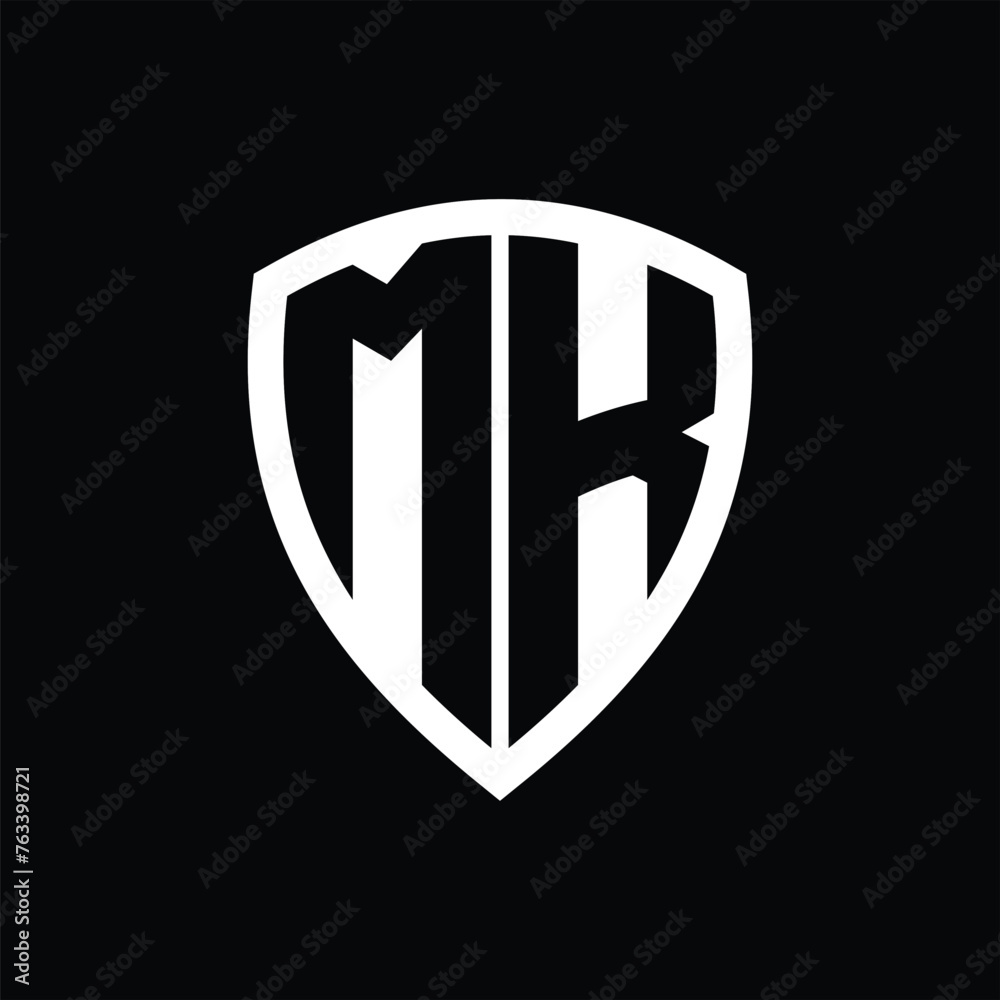 MK monogram logo with bold letters shield shape with black and white color design MK monogram logo with bold letters shield shape with black and white color design