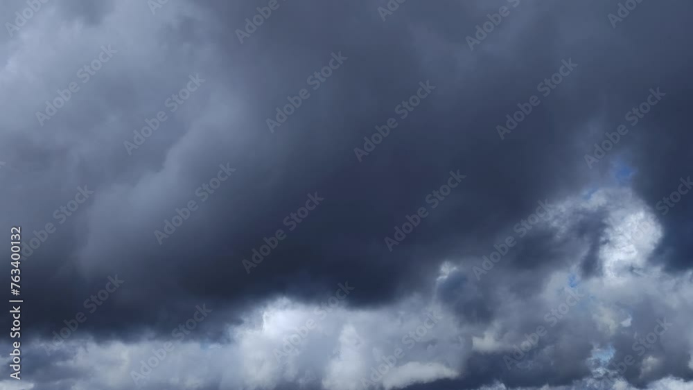 Incredible movie landscape of the sky full of beautiful black and white cumulus clouds Incredible movie landscape of the sky full of beautiful black and white cumulus clouds