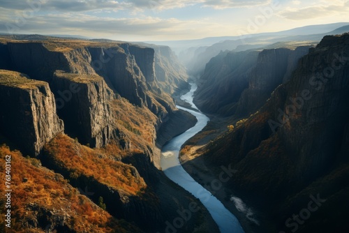 Aerial perspective of a scenic river gorge with towering cliffs