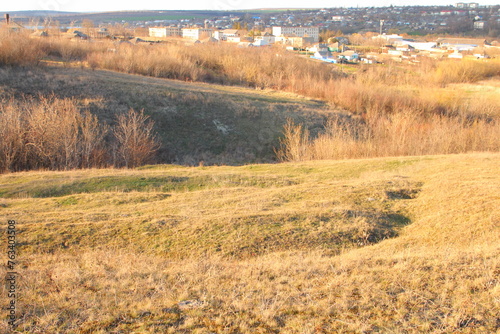 Fototapeta Naklejka Na Ścianę i Meble -  A field with a sign in the middle