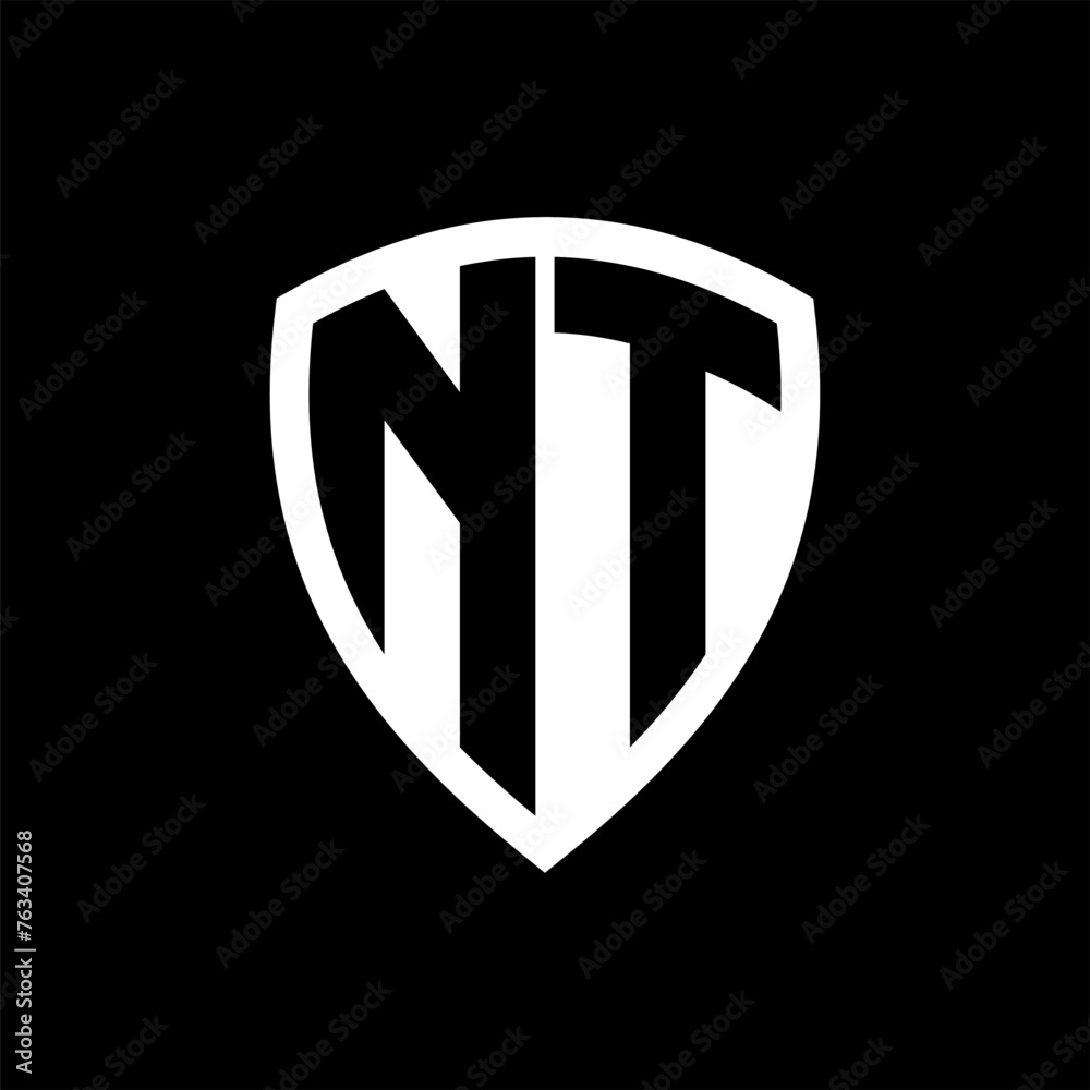 NT monogram logo with bold letters shield shape with black and white color design NT monogram logo with bold letters shield shape with black and white color design