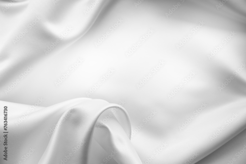 Rippled white silk fabric background. Copy space
