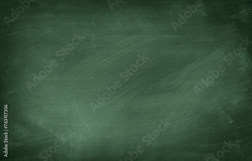 Chalk rubbed out on green chalkboard background © Stillfx