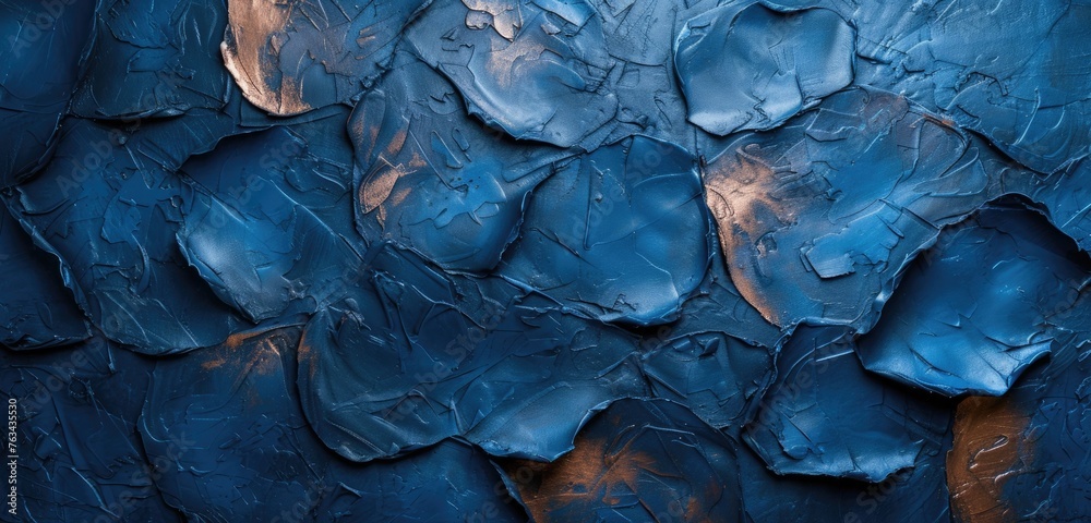 Navy blue stucco wall with intricate relief, abstract design. Wide-angle shot, rough texture. Copper background.