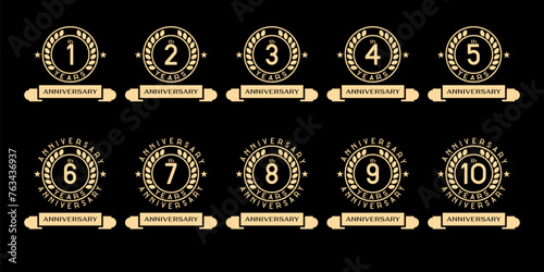 set of 1-10th anniversary celebration symbols. anniversary logo with gold circle and ribbon photo