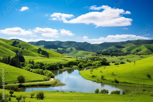 Rolling hills and a clear pond forming a tranquil natural vista