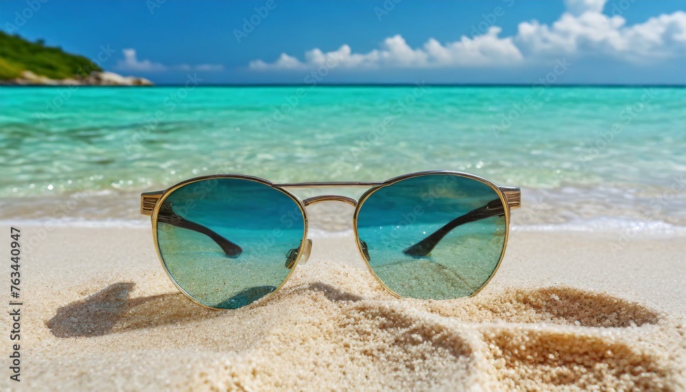 Sunglasses and tranquility on a sandy beach with turquoise water