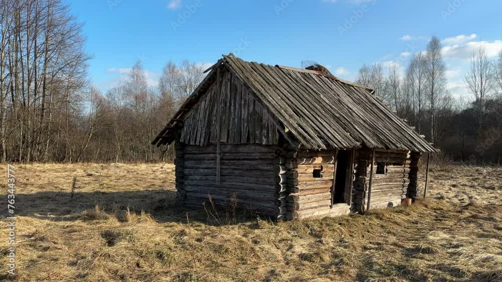 Abandoned house in village. Old wooden house in countryside in spring. No people in village. Old House in rural. Abandoned village with destroyed houses. Wooden Home ruin in countryside Abandoned house in village. Old wooden house in countryside in spring. No people in village. Old House in rural. Abandoned village with destroyed houses. Wooden Home ruin in countryside