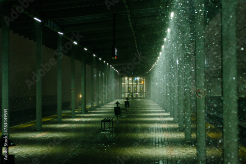 Railway station at night during snowfall