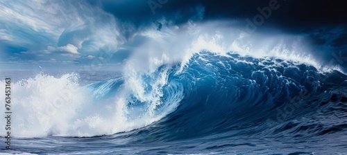 A large, crashing wave in the ocean, displaying raw power and force
