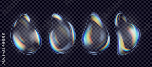 Set of abstract transparent liquid drops with glare. Bubbles with refraction and glow effect on a dark checkerboard background