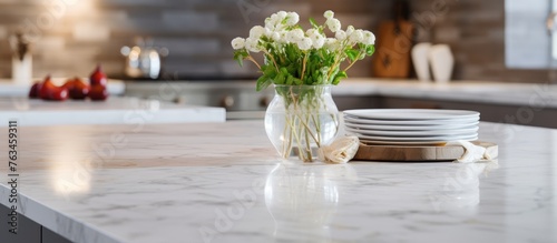 Vase of flowers on kitchen counter with plates #763459311