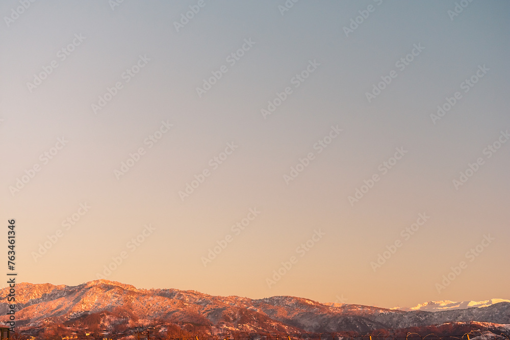 Naklejka premium Mountains against the sky during sunset. Mountains near the airport of the Georgian city of Batumi.
