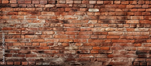 Ancient red brick wall with many bricks