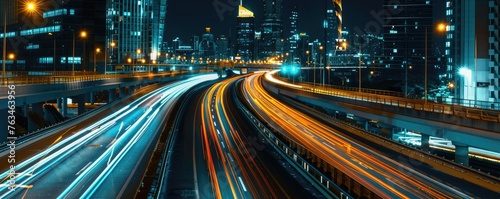 A long exposure shot of a busy highway at night showing vibrant light trails from the fast-moving cars  depicting the bustle of modern life.