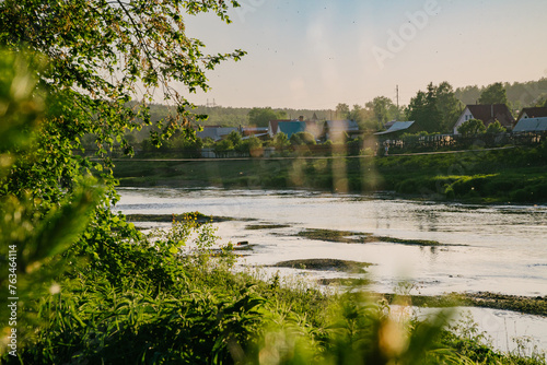 Summer Day Riverside with Hanging Bridge